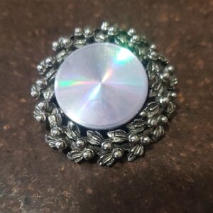 Vintage Jewelarama Silver Brooch with Iridescent Center.